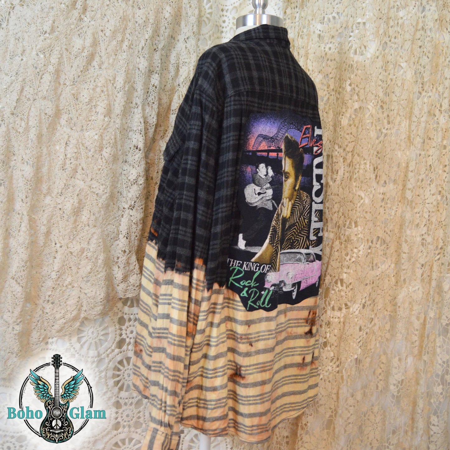 A black plaid flannel shirt with a bleached light bottom half and a large Elvis Presley graphic applique on the back