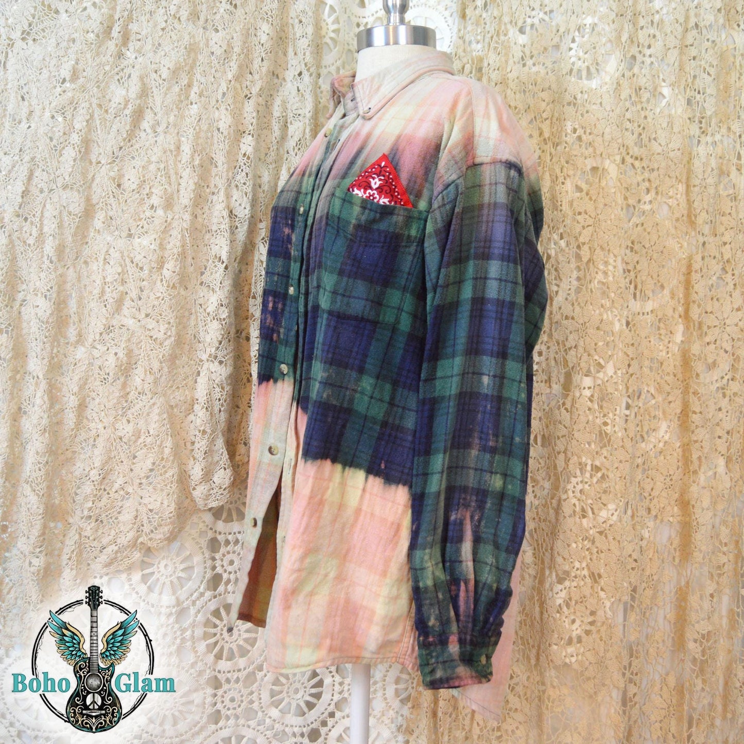 Side Angle View: A three-quarter view highlighting the cuff detail and the unique bleach splatter patterns on the dark green flannel.