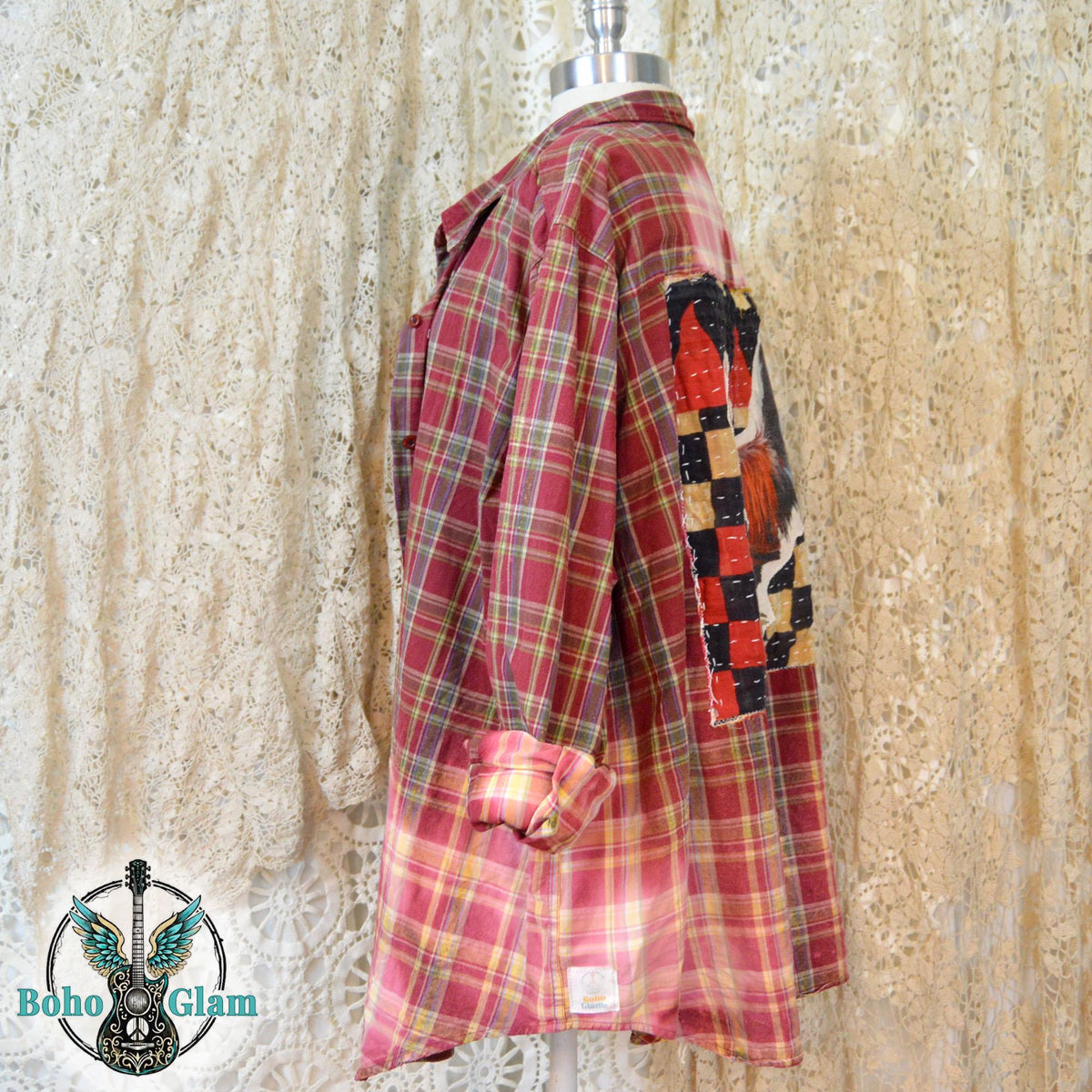 Side View on Mannequin: A side profile of the long sleeve flannel showing the rolled cuffs and the jagged hand dipped bleach line.