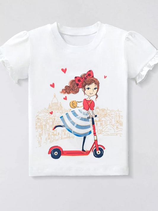 White t-shirt with a colorful graphic of a girl on a scooter and hearts on a light gray background