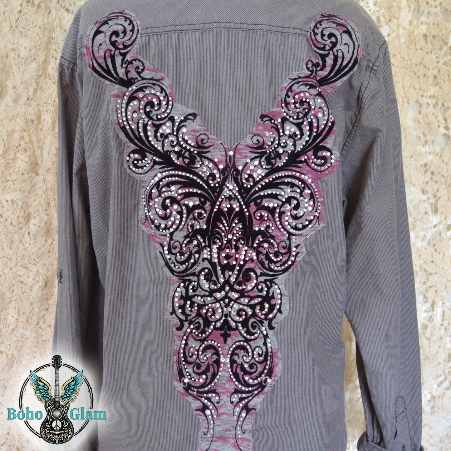 A charcoal gray corduroy button down shirt featuring a large pink and black filigree applique embellished with clear rhinestones.