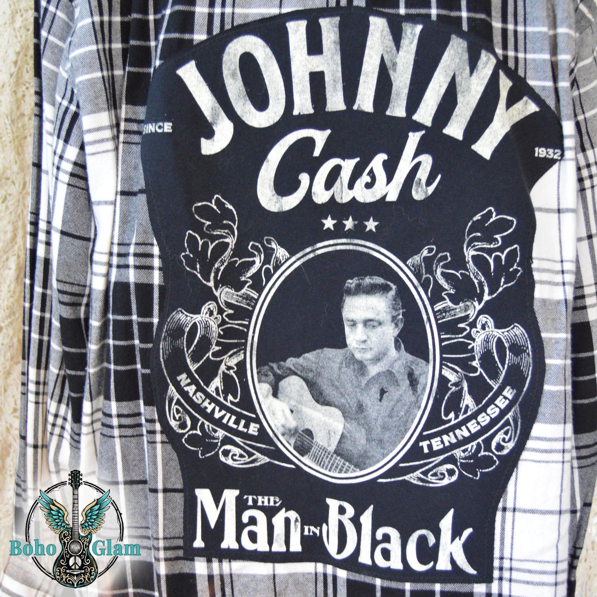 Graphic Detail: A close-up shot of the back of the shirt showing the detailed Johnny Cash Nashville Tennessee graphic with a photo of him playing guitar.