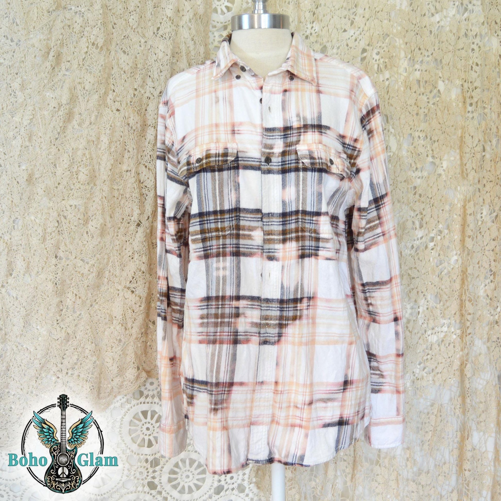 Front View: A long-sleeved button-down plaid shirt in cream, brown, and peach tones with a custom bleached, sun-faded effect.
