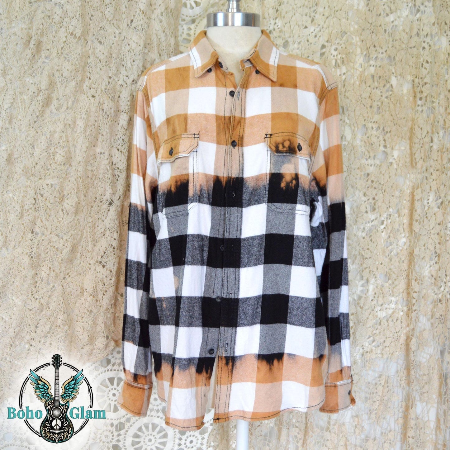 Front View on Mannequin: A long-sleeved button-down flannel showing a horizontal bleach line that separates the tan upper half from the black lower half.