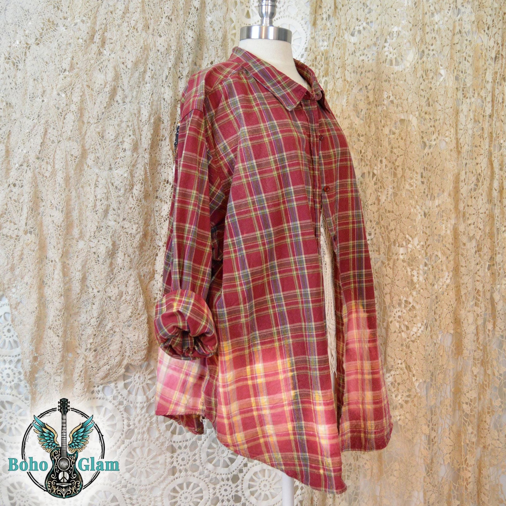Side View on Mannequin: A side profile of the long sleeve flannel showing the rolled cuffs and the jagged hand dipped bleach line.