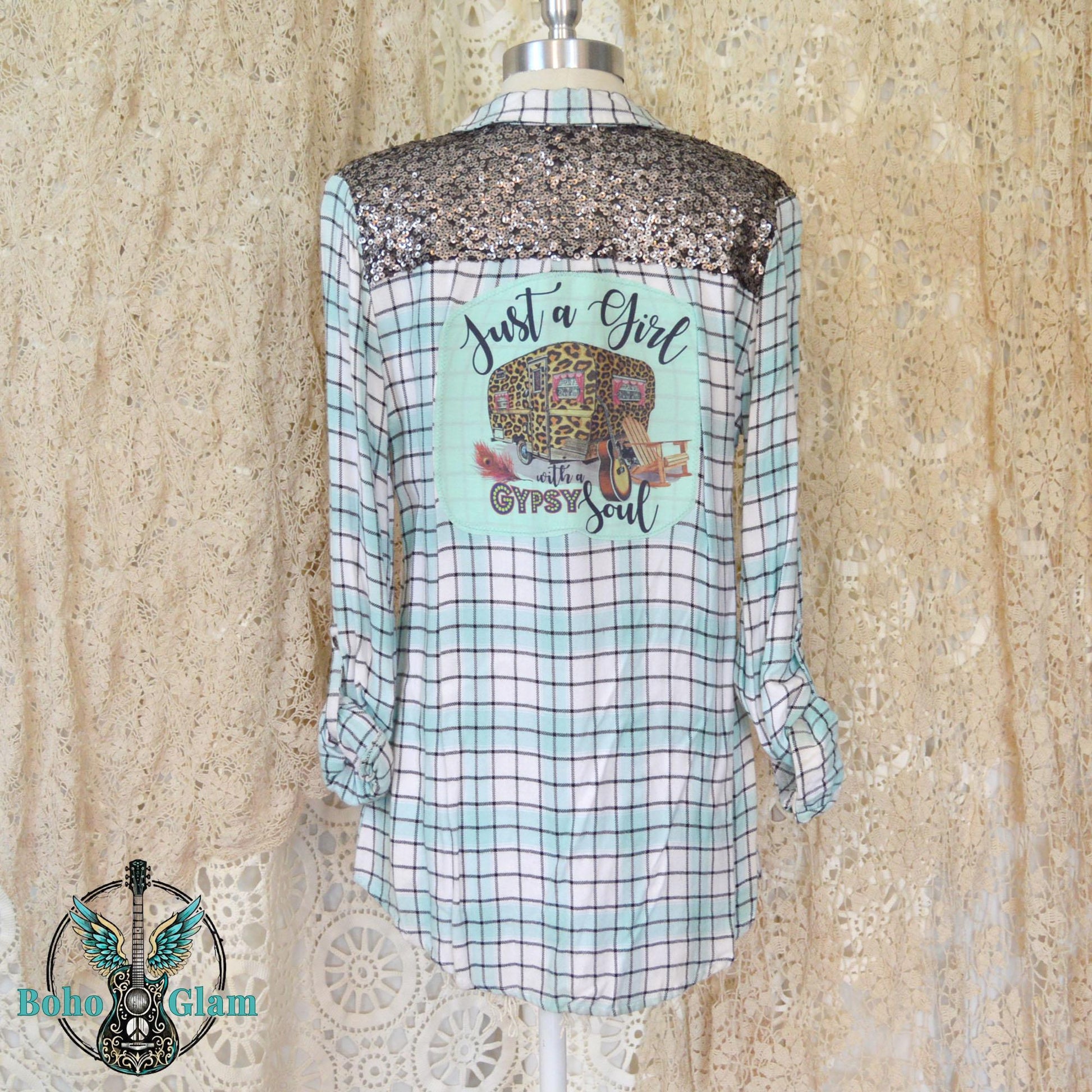 Back on Mannequin: Rear view of the upcycled mint plaid shirt on a mannequin highlighting the sequin detailing and the Gypsy Soul graphic.