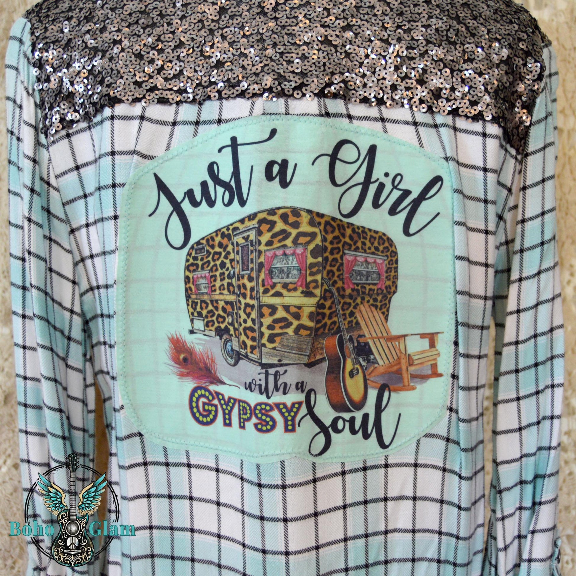 Back Close-up: Close-up of the back graphic featuring a leopard print camper and the text Just a Girl with a Gypsy Soul below silver sequins.