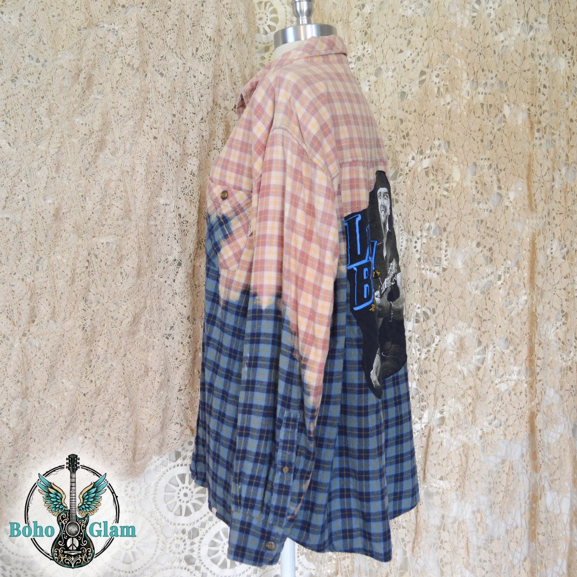 Side View: mannequin display showing the side profile of the long sleeve shirt and the jagged hand-dipped bleach line transitioning from peach to blue.