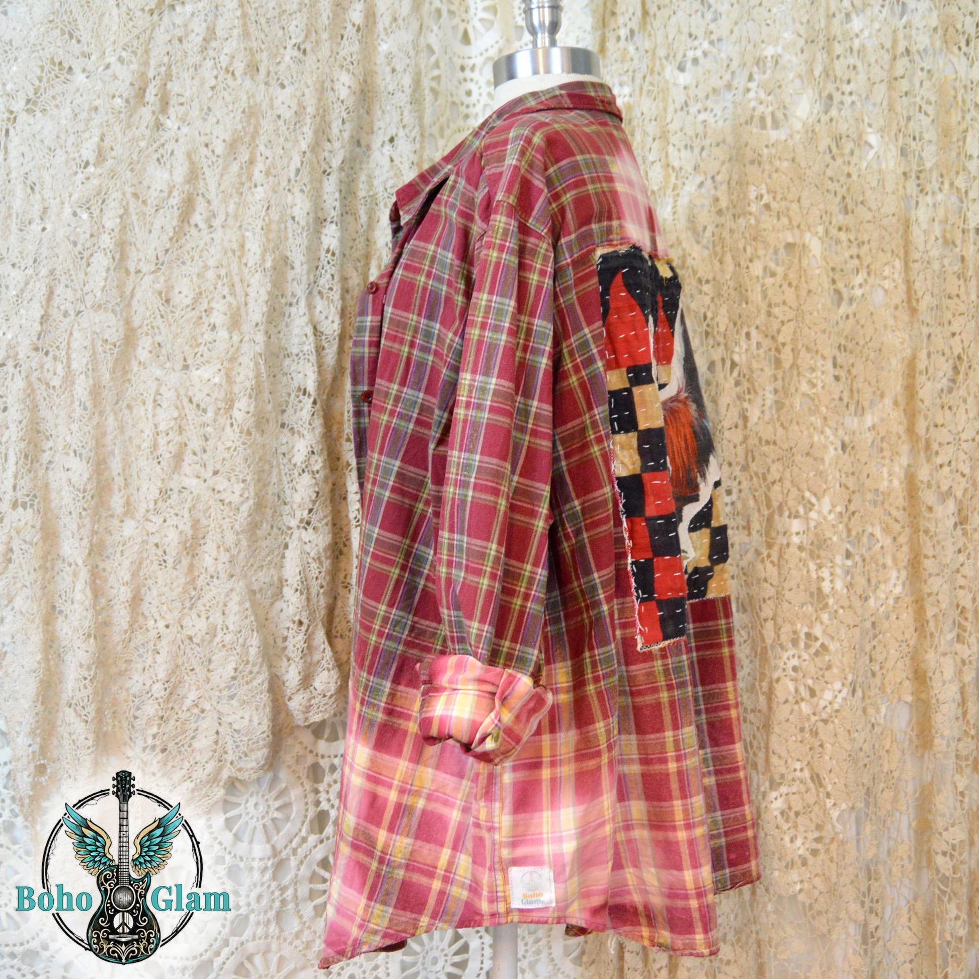 Side View on Mannequin: A side profile of the long sleeve flannel showing the rolled cuffs and the jagged hand dipped bleach line.